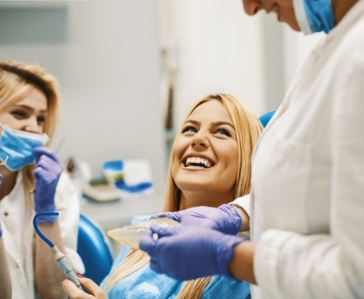 Dental patient smiling at dentist