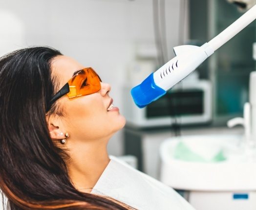 Dental patient receiving professional teeth whitening