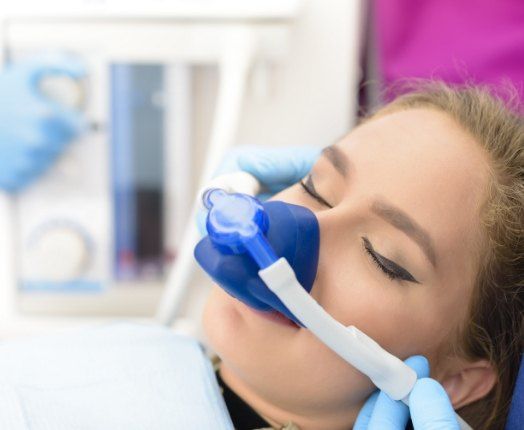 Woman receiving nitrous oxide dental sedation