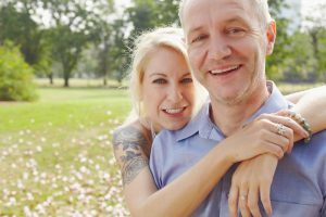 couple embracing at the park