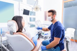 woman talking to dentist in Harker Heights