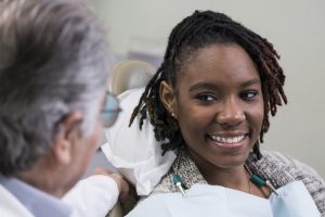 woman talking to dentist in Harker Heights